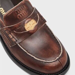 Miu Miu
Leather Coin Penny Loafers